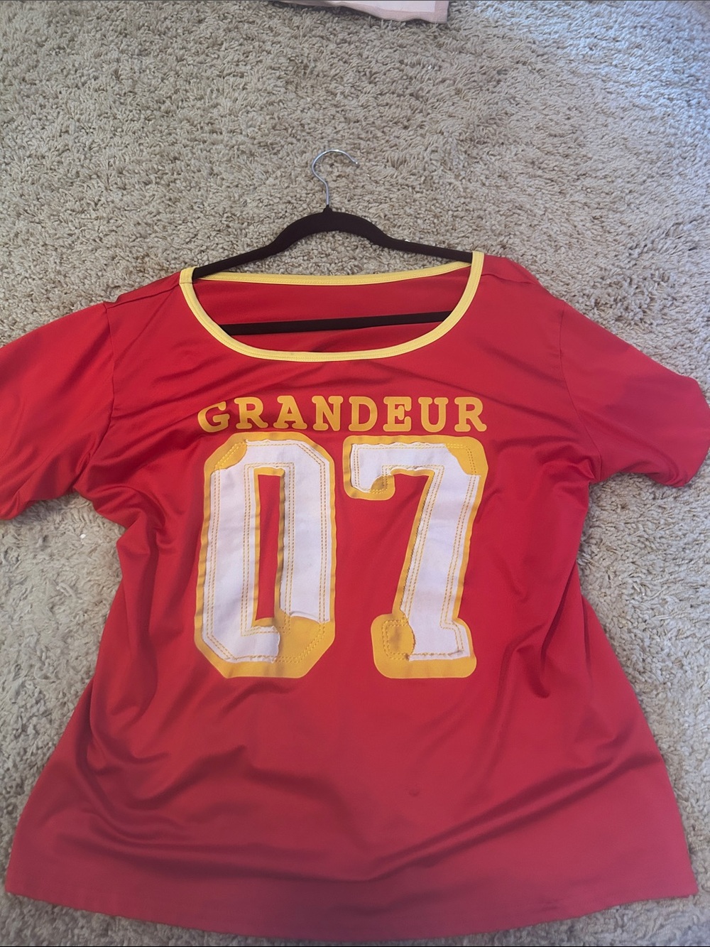 Oversized off shoulder graphic sports tee